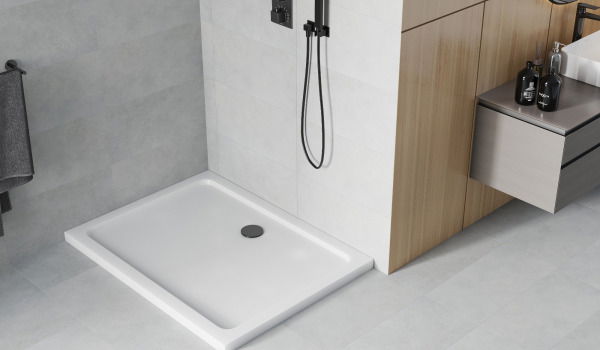 White shower tray with black accents